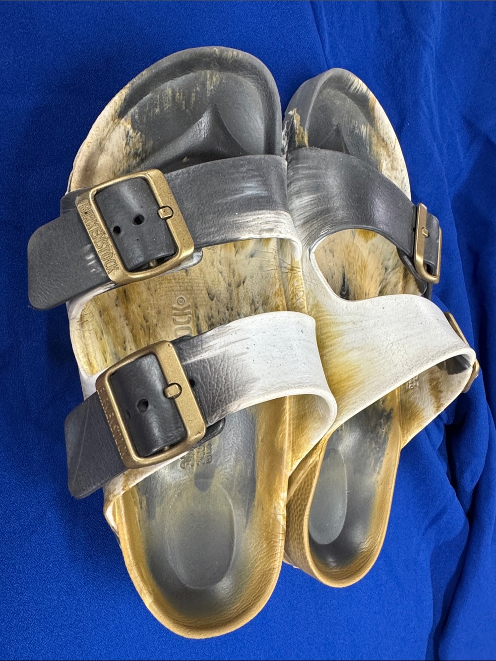 Birkenstock Arizona Two-Strap Sandals in Black, White and Tan
